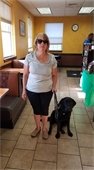 Pam with black lab guide dog Ume