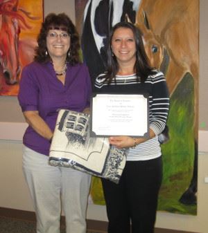Library Board Trustee Pam Raynock with Theresa Gogluicci, owner of Healthy Body Massage Therapy