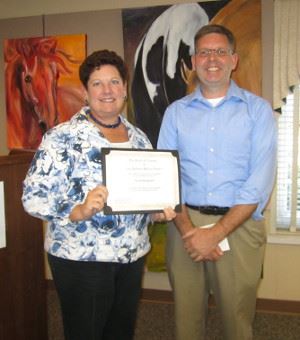Library Board Trustee Diane Stamm with Scott Hoagland
