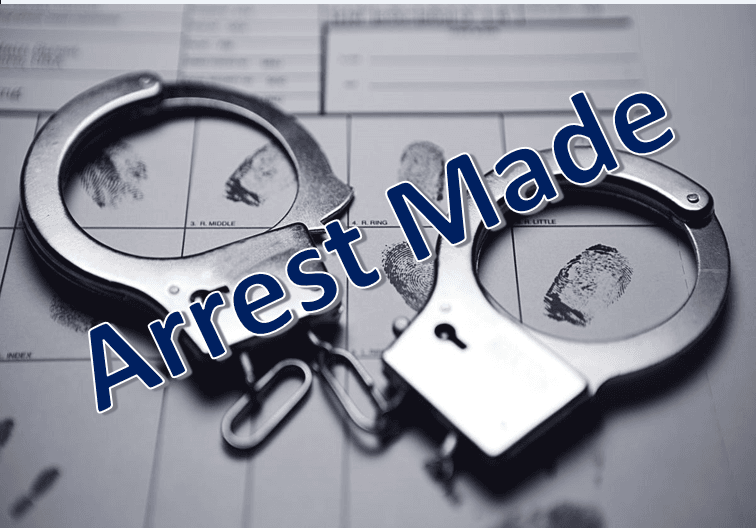 Image of handcuffs with the words Arrest Made